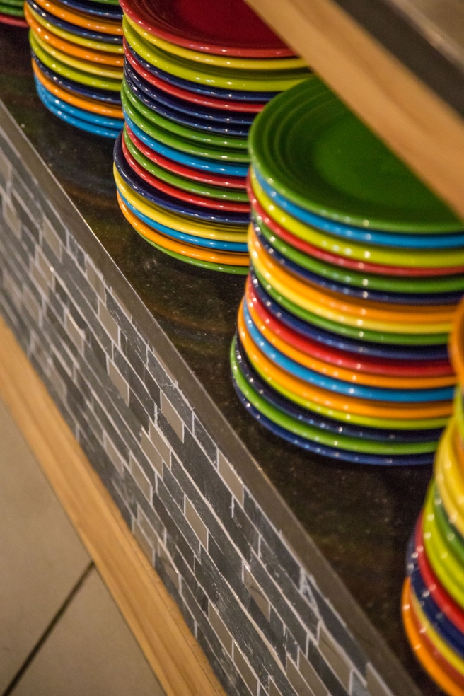 colorful plates in a college dining hall