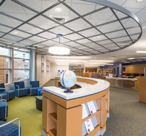 interior of a public school library showing books and seating areas