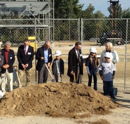 people with shovels in hard hats at a groundbreaking for mountview middle school