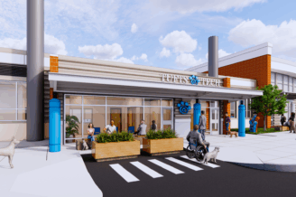 rendering of the front exterior of a vet tech clinic's separate entrance from the attached worcester technical high school