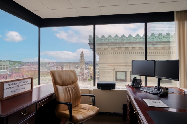 empty office with view of Worcester through the large windows