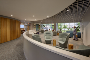 lobby area of wellness center with small groups of people seated