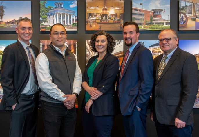 LPA|A's five associate principals standing in the office